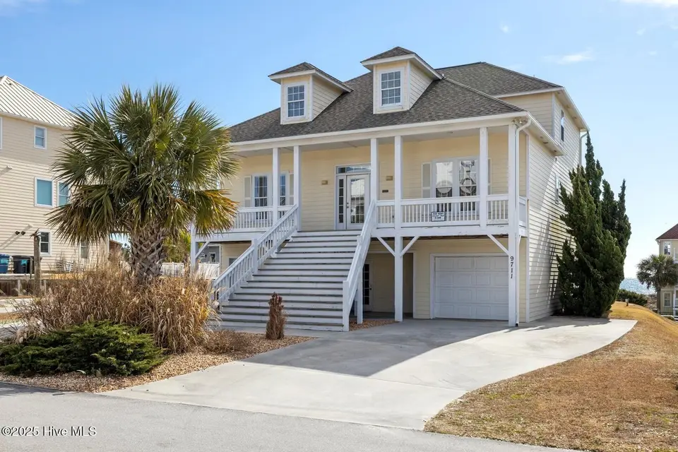 9711 Dolphin Ridge Road, Emerald Isle, NC 28594 – photo 1 of 37: Once Upon a Time front