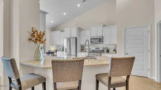 8667 Baton Rouge Avenue NW, Calabash, NC 28467 – photo 3: crs_1946_pic_stphillips_kitchen_1of2_f1