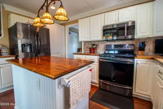 1103 S Topsail Drive, Surf City, NC 28445 – photo 22: kit 2 topsail