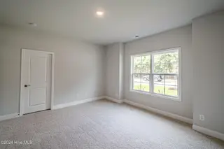 1025 Wood Creek Road NE, Leland, NC 28451 – photo 24: *REPRESENTATIVE PHOTO* Bedroom 2