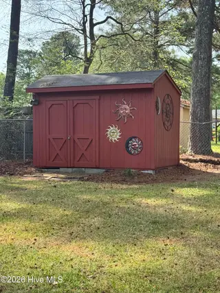 1311 Briarwood Drive NW, Wilson, NC 27896 – photo 8: Backyard Storage Building