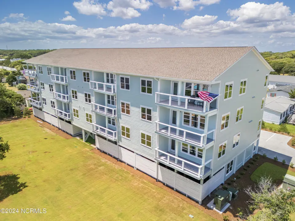 109 Knollwood Drive G, Atlantic Beach, NC 28512 – photo 1 of 55: DJI_20240619141626_0126_D-HDR