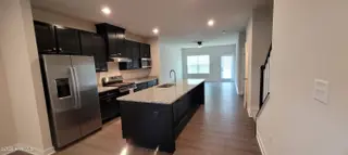 306 Spinnaker Street # A, Elizabeth City, NC 27909 – photo 2: Kitchen & Living Room
