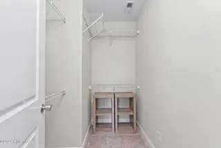 133 NE 3rd Street, Oak Island, NC 28465 – photo 17: 2nd bedroom closet