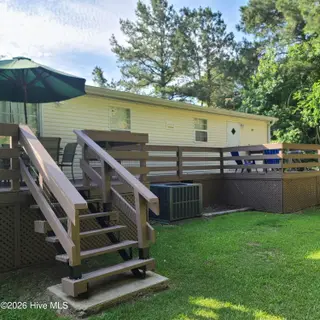 107 Eagle Ridge Drive, Dudley, NC 28333 — 4-bedroom manufactured home in Eagle Ridge, Dudley, NC, photo 17 of 17: Back