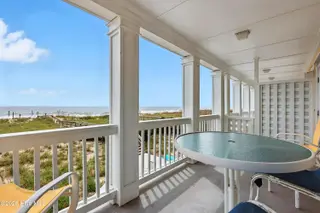 1106 Fort Fisher Boulevard N Unit 1, Kure Beach, NC 28449 – photo 24: 23 - Balcony Off Living Room