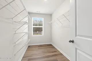 1063 Hanson Drive, Leland, NC 28451 – photo 16: Wardrobe Walk-in Closet