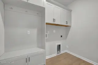 1210 Sunwater Terrace, Leland, NC 28451 — 3-bedroom townhome in Grand Park, Leland, NC, photo 12 of 46: Laundry Room