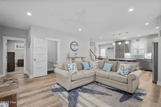 245 NE 64th Street, Oak Island, NC 28465 – photo 10: 25-web-or-mls-DSC04924