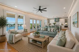 208 Radio Island Road, Morehead City, NC 28557 — 4-bedroom home in Tide Lines, Morehead City, NC, photo 17 of 62: living room vs sofas