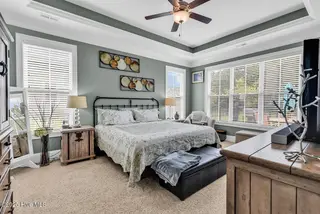 3032 Eno Lane, Leland, NC 28451 — 4-bedroom home in Brunswick Forest, Leland, NC, photo 16 of 55: Master Bedroom
