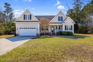 916 Sloop Point Loop Road, Hampstead, NC 28443 – photo 1: 01-FinalExteriorHampstead-3