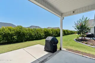 7000 Sevilleen Drive SW, Ocean Isle Beach, NC 28469 – photo 12: S back yard