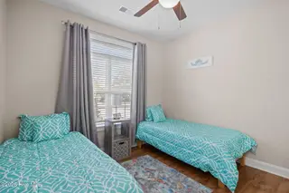 129 NW 11th Street, Oak Island, NC 28465 – photo 22: bedroom 2