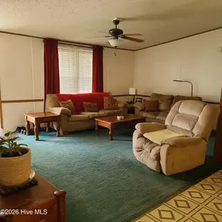 107 Eagle Ridge Drive, Dudley, NC 28333 — 4-bedroom manufactured home in Eagle Ridge, Dudley, NC, photo 5 of 17: Living Room 2