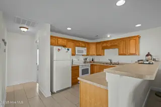 5022 E Oak Island Drive Apt 3, Oak Island, NC 28465 – photo 6: tempImage8s67NP