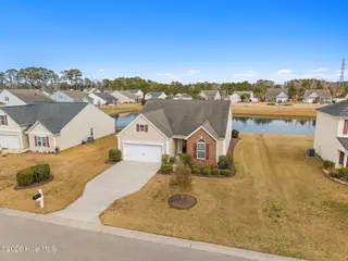 34 Lighthouse Cove Loop 113, Calabash, NC 28467 — 3-bedroom home in Lighthouse Cove, Calabash, NC, photo 2 of 46: 4-web-or-mls-DJI_20260208114731_0343_D