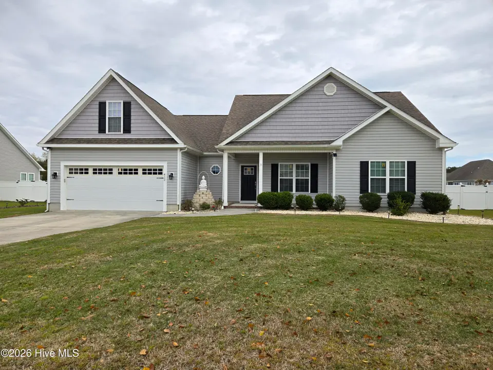 412 Moss Springs Drive, Peletier, NC 28584 – photo 1 of 25: Front