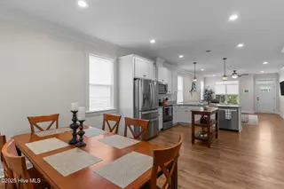 162 NW 9th Street, Oak Island, NC 28465 – photo 17: dining kitchen living rm