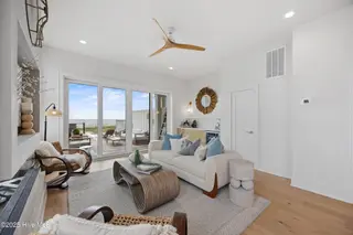 605 Fort Fisher Boulevard S Unit A, Kure Beach, NC 28449 – photo 8: 35_living room