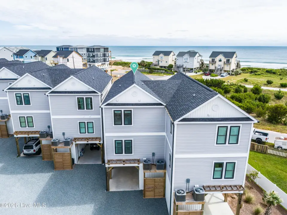 711 N Topsail Drive, Surf City, NC 28445 — 3-bedroom townhome in Dune Ridge, Surf City, NC, photo 1 of 65: 051_dji_20260925132001_0055_dp_707