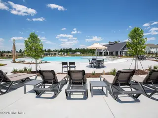8611 Blue Haw Way Lot 124, Leland, NC 28451 — 5-bedroom home in Indigo Preserve, Leland, NC, photo 24 of 33: 031-010-IndigoPreservePoolL3-1280x960