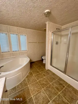 616 7th Street SE, Bolivia, NC 28422 — 3-bedroom manufactured home in Sunset Harbor, Bolivia, NC, photo 12 of 24