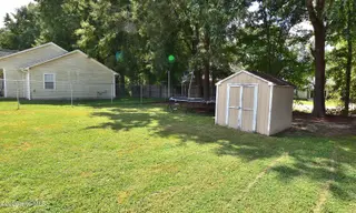 720 Westview Court, Nashville, NC 27856 – photo 24: Back Yard and Storage Building