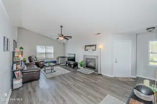 126 Forest Bluff Drive, Jacksonville, NC 28540 — 3-bedroom home in River Hills, Jacksonville, NC, photo 4 of 22: Living Room