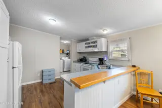 1109 Nautical Lane SW, Calabash, NC 28467 — 4-bedroom manufactured home in Village At Calabash, Calabash, NC, photo 8 of 34: Kitchen