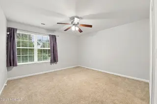 212 Gracie Farms Road, New Bern, NC 28560 — 4-bedroom home in Tyler, Home on the Lake, New Bern, NC, photo 20 of 32: Bedroom 1