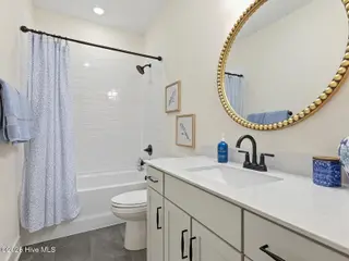 9251 Salty Breeze Place, Leland, NC 28451 — 5-bedroom home in Grand Park, Leland, NC, photo 8 of 42: Bathroom 1