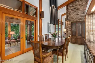 159 Loblolly Drive, Pine Knoll Shores, NC 28512 – photo 12: Dining room into porch