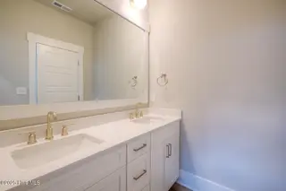 170 NE 31st Street, Oak Island, NC 28465 – photo 21: 170 NE 31st St Oak Island NC-large-026-0