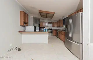 210 Creek Bank Drive, New Bern, NC 28560 — 3-bedroom manufactured home in Creekwater Haven, New Bern, NC, photo 22 of 58: Kitchen