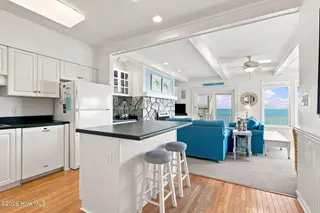 2801 Pier Pointe Drive B2, Emerald Isle, NC 28594 – photo 16: Open concept kitchen and living room