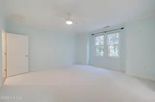 636 Village Park Drive 101, Wilmington, NC 28405 – photo 21: Primary Bedroom