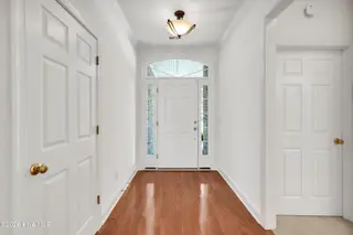 1009 N Sanderling Drive, Leland, NC 28451 — 3-bedroom townhome in Waterford of the Carolinas, Leland, NC, photo 4 of 63: Foyer