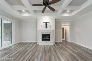 8983 Mango Bay Court NE, Leland, NC 28451 — 4-bedroom townhome in Compass Pointe, Leland, NC, photo 7 of 53: Bright & Airy Living Room