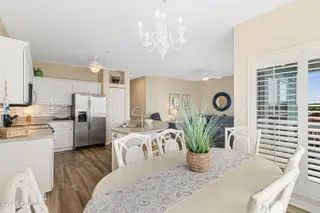 105 Beachwood Drive 1c Blue Water Condominiums, Atlantic Beach, NC 28512 – photo 10: Dining area with ocean views