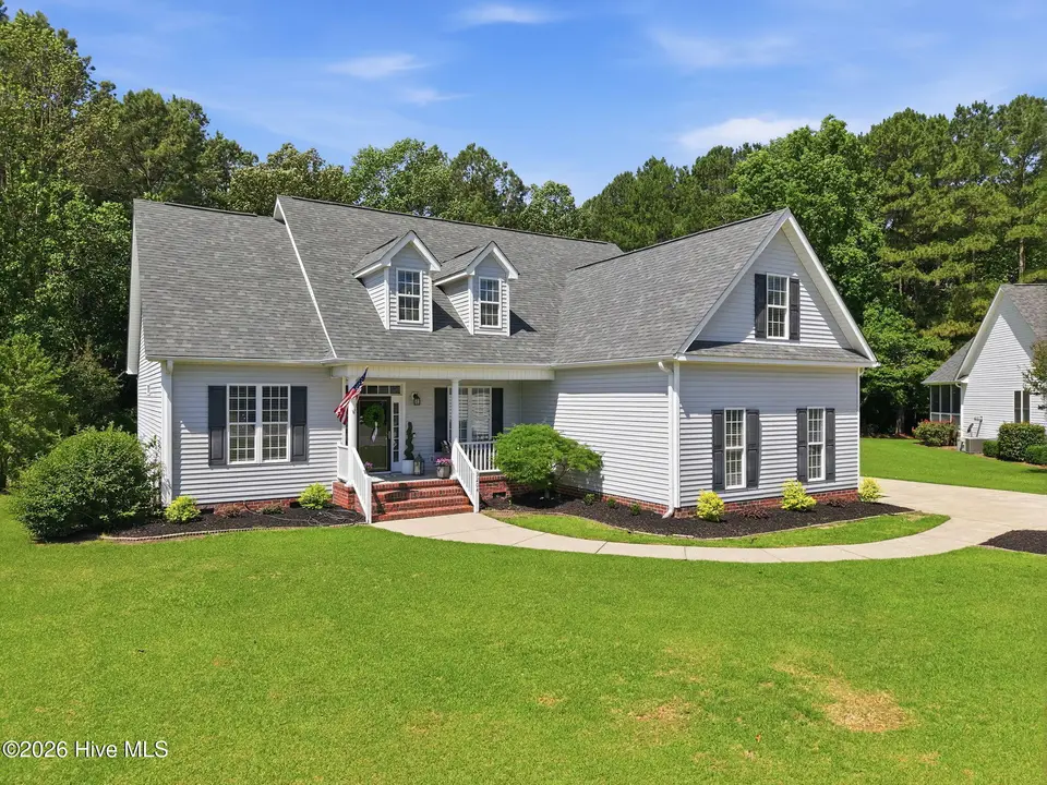 3204 Misty Pines Road, Greenville, NC 27858 – photo 1 of 48: 1-web-or-mls-DJI_20260602110206_0014_D