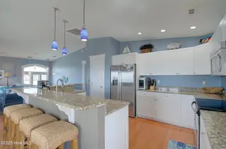 1404 E Dolphin Drive, Oak Island, NC 28465 – photo 14: 1440Edolphin - 22