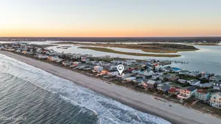 5419 W Beach Drive, Oak Island, NC 28465 – photo 10: 109_drone