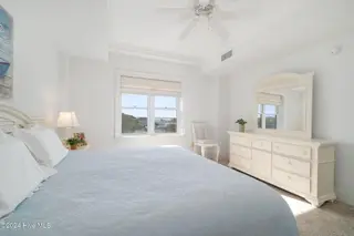 4425 Arendell Street 303 Harborside Club At 70 West, Morehead City, NC 28557 – photo 20: Primary bedroom suite