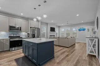 245 NE 64th Street, Oak Island, NC 28465 – photo 14: 31-web-or-mls-DSC04948