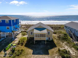 2011 W Beach Drive, Oak Island, NC 28465 – photo 2: 11-web-or-mls-DJI_20251031125526_0307_D