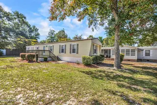 9021 Bonaparte Drive SW, Calabash, NC 28467 – photo 1: Front View of Home