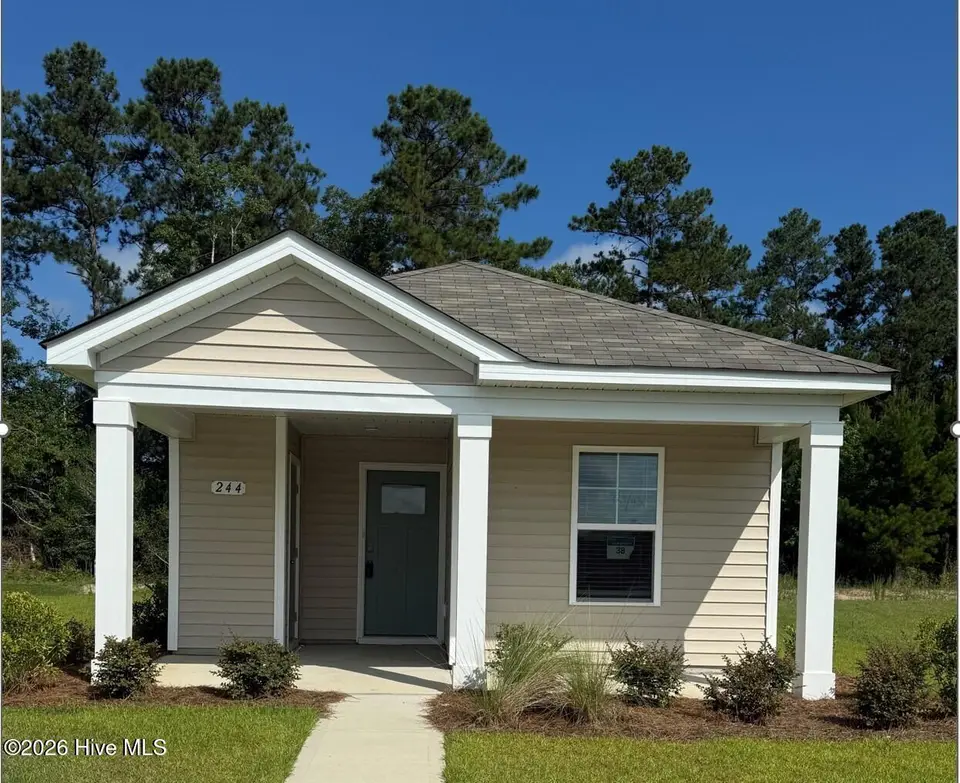 244 Ashworth Drive, Tabor City, NC 28463 – photo 1 of 14: Lot 38 - 244 Ashworth Drive
