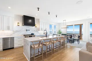 3503 Ocean Drive E, Emerald Isle, NC 28594 – photo 2: Main Kitchen Open to Dining and Living A