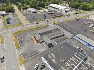 3111 S Memorial Drive, Greenville, NC 27834 – photo 5: 7-web-or-mls-DJI_20260622151603_0074_D
